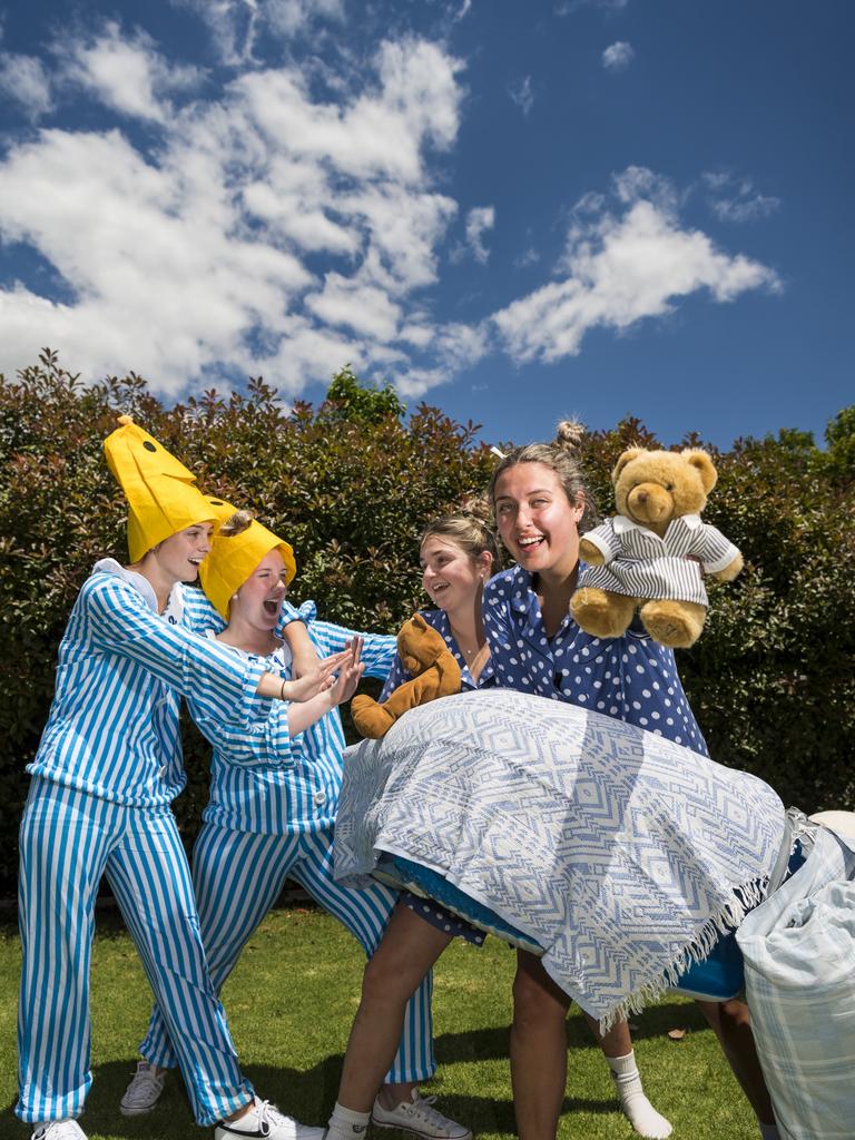 Banana's in Pyjamas Mikayla Wust (left) and Halle Goodall with teddies Zoe Wallace and Audrey Herridge as St Ursula's College students prepare for their boat race during St Ursula's Week, Wednesday, October 20, 2021. Picture: Kevin Farmer