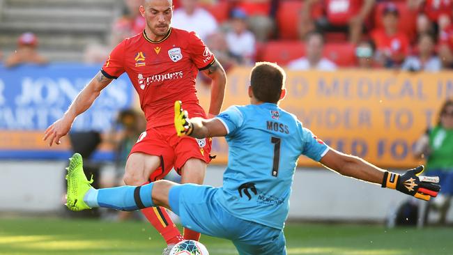 Adelaide United midfielder James Troisi slots home the Reds’ late winner against Newcastle Jets at Hindmarsh Stadium. Picture: Mark Brake/Getty Images