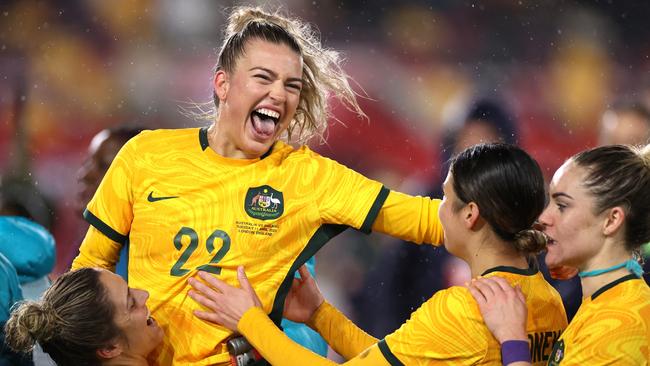 Charlotte Grant celebrates victory with teammates after defeating England in April. (Photo by Ryan Pierse/Getty Images)