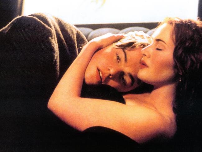 Leonardo DiCaprio and Kate Winslet take their love to new depths in the famous steamed-up car window scene in ‘Titanic’, 1997. Picture: Getty