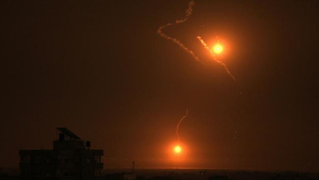 Flares fired by the Israeli army light up the sky east of Khan Yunis on the southern Gaza Strip on October 27. Picture: AFP