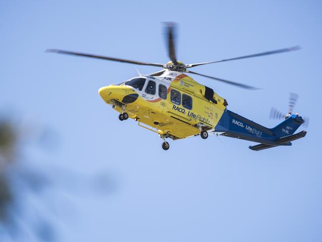 The RACQ LifeFlight rescue helicopter is seen flying over Toowoomba, Sunday, July 18, 2021. Picture: Kevin Farmer