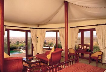 Relax ... the resort's luxurious bungalows resemble Bedouin tents, but they're stocked with pillow menus, Bulgari soaps and decanters of sherry