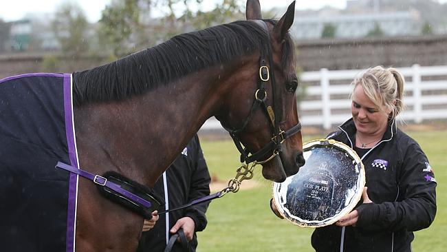 Winx at Flemington with stable foreman Jo Taylor. Picture: David Crosling