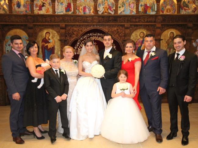 Nada Stoyanovski, fourth from right, with family at her daughter Kristie's wedding