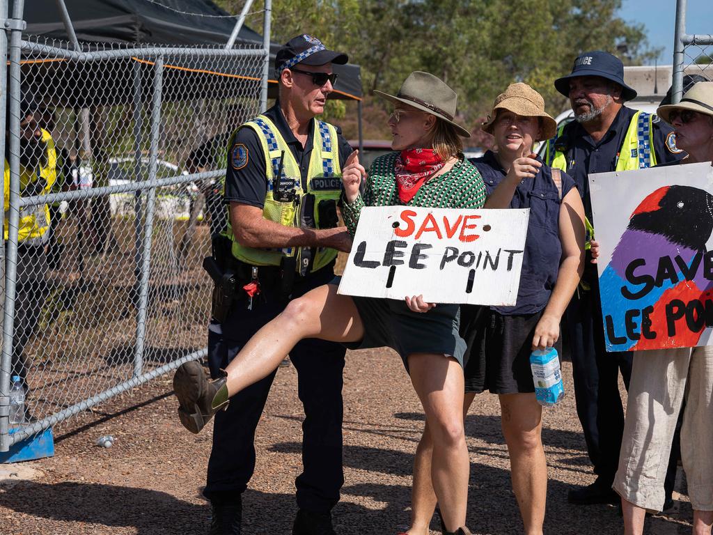 Sib Hare Breidahl getting pushed at the Lee Point Defence Housing Australia Development protest as bulldozers move in on Stage 2 of the project. Picture: Pema Tamang Pakhrin