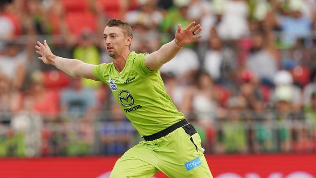 Daniel Sams wheels off in celebration after one of his 15 BBL wickets.