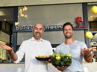 Greg Dunn and Tim Johnson run Comuna Cantina at Pacific Fair, Broadbeach. Picture: AAP - John  Gass