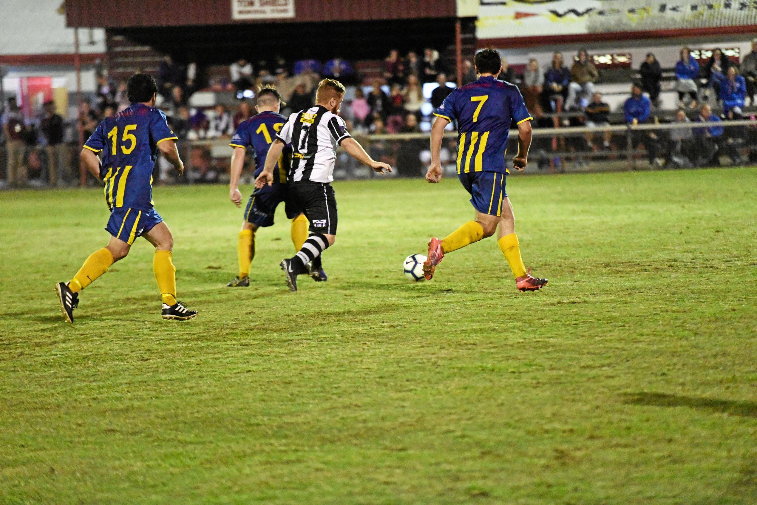 Bingera's Shaun Sergiacomi fires a shot that went into the net. Picture: Shane Jones