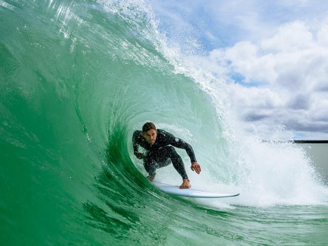 Chris Hemsworth tests out the URBNSURF in Melbourne. Picture: URBNSURF + Ed Sloane