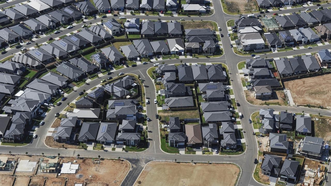 Blocks of dark-coloured roofs contribute to the sweltering heat in western Sydney.