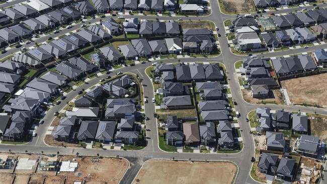 Blocks of dark-coloured roofs contribute to the sweltering heat in western Sydney.