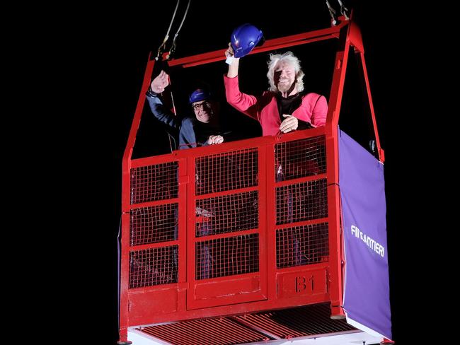 Richard Branson, right, and the president and CEO of Virgin Voyages, Tom McAlpin, attend the ceremony for the launching of the first Virgin cruise ship, in Italy. Picture: Luca Zennaro/ANSA via AP