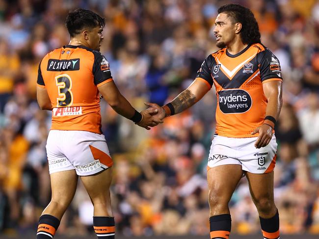 SYDNEY, AUSTRALIA - MARCH 23: Isaiah PapaliÃ¢â¬â¢I of the Tigers reacts during the round three NRL match between Wests Tigers and Cronulla Sharks at Leichhardt Oval, on March 23, 2024, in Sydney, Australia. (Photo by Jeremy Ng/Getty Images)