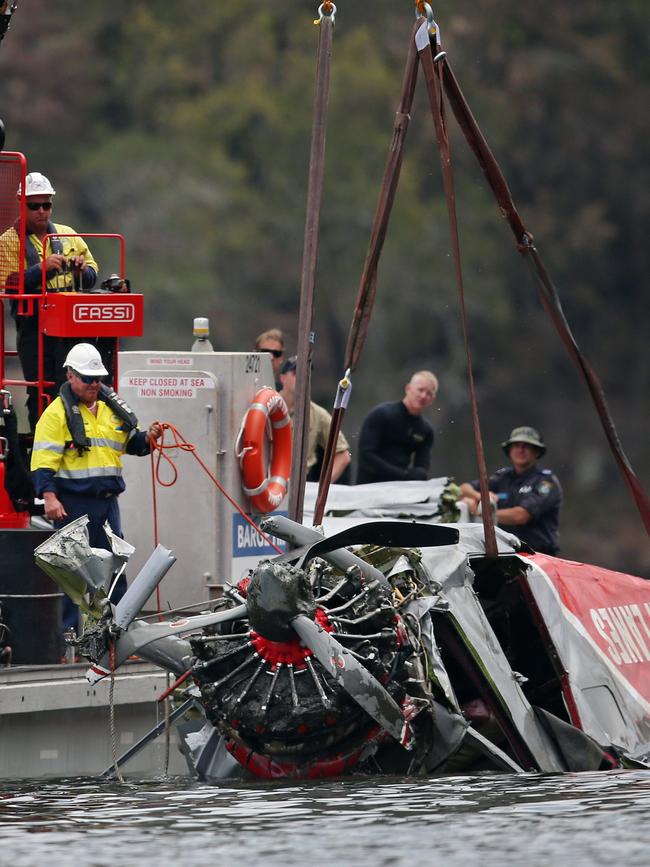 Pictured at Jerusalem Bay in Sydneys Hawkesbury river are police attached to Marine Area Command, during an operation to recover the wreckage of a Sydney Seaplane that crash into the water on New Years Eve. Picture: Richard Dobson.