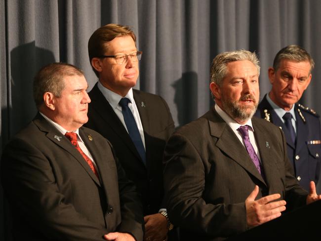 President of Police Association of NSW, Tony King, far left, said in some areas, one officer is given the job to keep track of over 100 offenders while doing other duties. Picture: Bob Barker