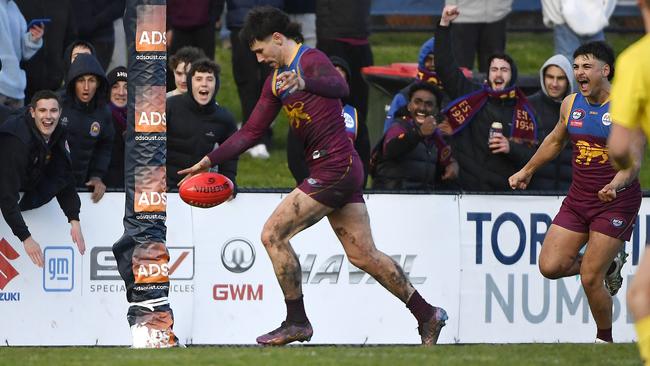 South Morang captain Tye Hall kicks a goal. Picture: Andrew Batsch