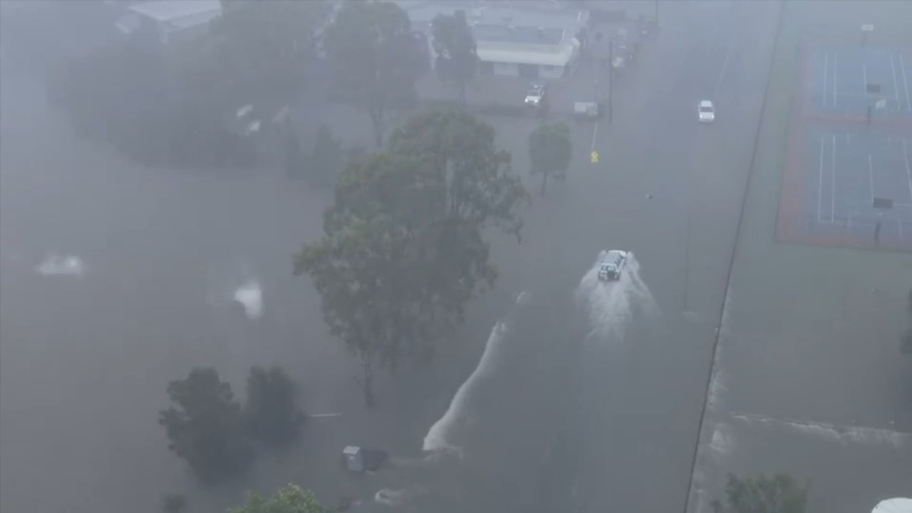 Drone footage shows Hervey Bay flash flooding crisis