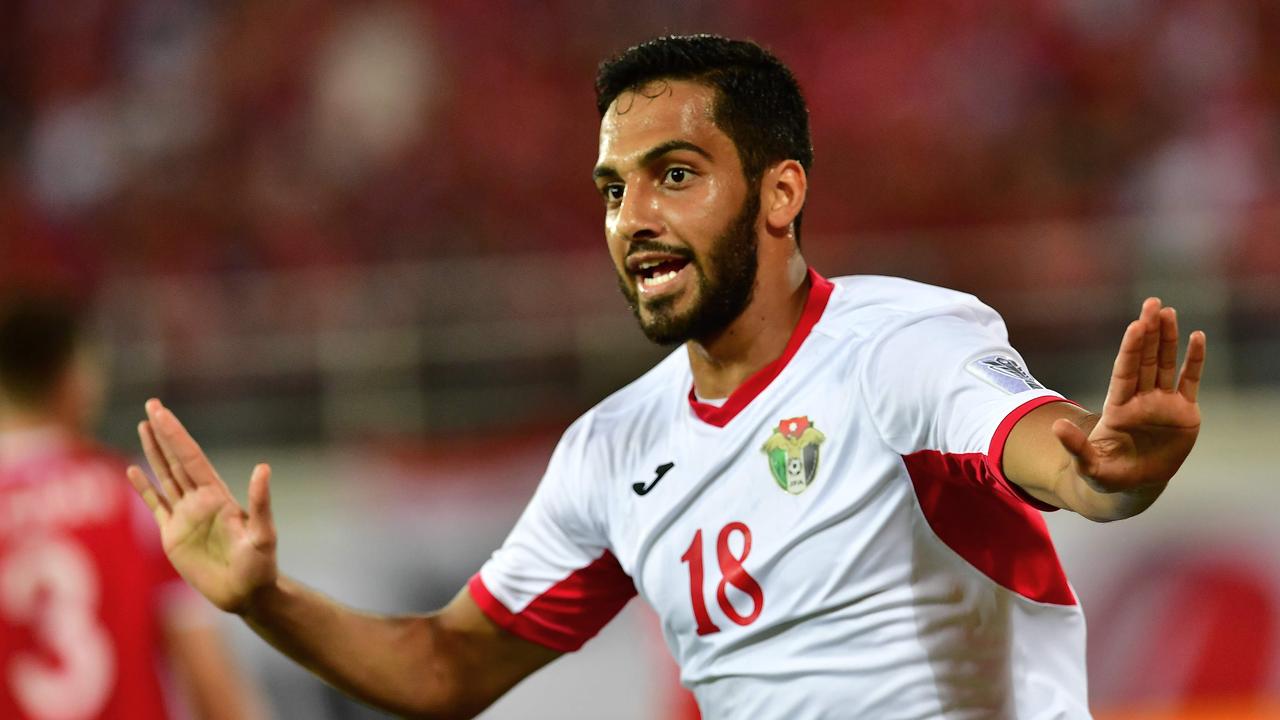 Jordan's forward Mousa Suleiman celebrates his goal.