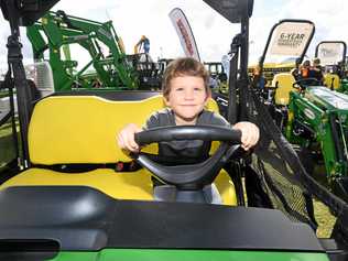 DRIVING FORCE: Jax Riley in Machinery Allley was one of many patrons driving the Gympie Show to success yesterday. Picture: Troy Jegers