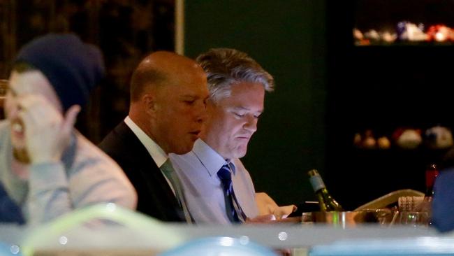 Peter Dutton and Mathias Cormann having dinner at Portia's Place restaurant in Kingston, Canberra. Picture: Jonathan Ng