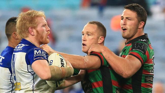 Jason Clark (centre) is key to the case of Sam Burgess (right). Picture: Mark Evans