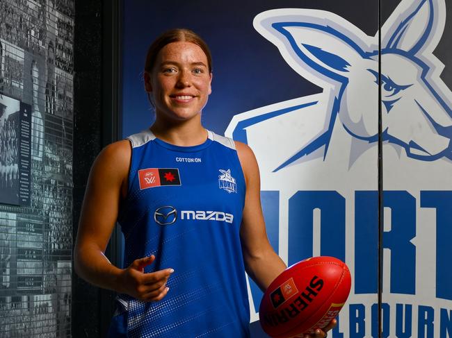 MELBOURNE, AUSTRALIA - NOVEMBER 28: Mia King of the Kangaroos poses during a North Melbourne Kangaroos AFLW media opportunity at Arden Street Ground on November 28, 2023 in Melbourne, Australia. (Photo by Morgan Hancock/Getty Images)