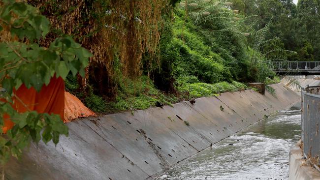 The asbestos stockpile on the edge of A’Becketts creek in Granville. Picture: AAP IMAGE/ Angelo Velardo