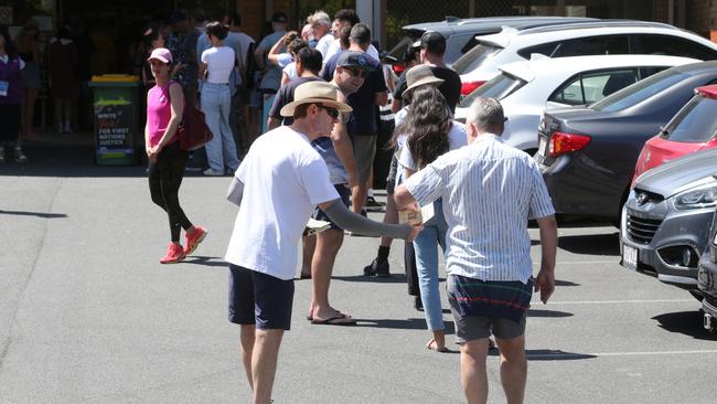 The line-up at the Broadbeach polling centre on the final day of voting in the Voice to Parliament referendum. Picture by Richard Gosling