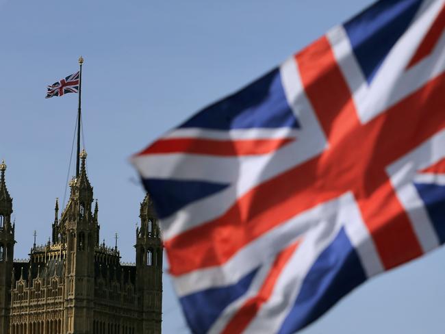 A Union flag flies near the Houses of Parliament, comprising the House of Commons and the House of Lords, in London on March 13, 2017. British Prime Minister Theresa May is expected to trigger Brexit this week by formally notifying the European Union of Britain's intention to leave the bloc, sending her country into uncharted waters. The legislation empowering May to put Britain on a course that no EU member state has ever taken returns to parliament for its final stages on Monday as European capitals prepare for mammoth negotiations. / AFP PHOTO / Daniel LEAL-OLIVAS