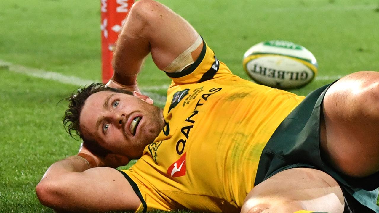 Bernard Foley reacts in horror after Israel Folau’s decision leads to a Wallabies loss.