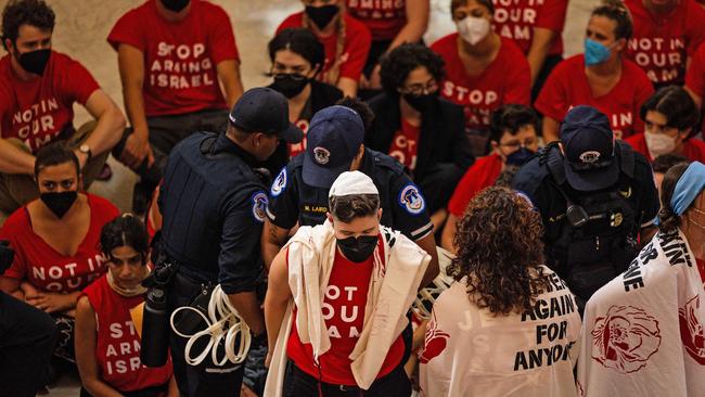 Demonstrators are taken into custody as they protest the war in Gaza in Washington before Mr Netanyahu is set to speak before congress. Picture: Getty Images