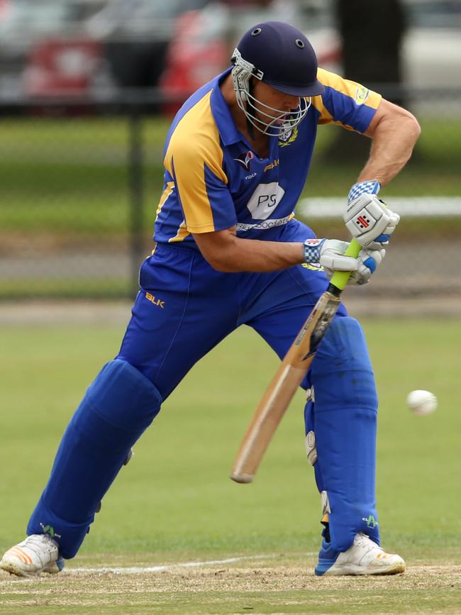 Luke Wintle defends for Noble Park.