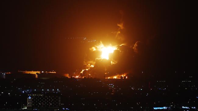 An Aramco oil depot close to the circuit is seen in flames following an incident during practice ahead of the F1 Grand Prix of Saudi Arabia. Picture: Lars Baron/Getty Images