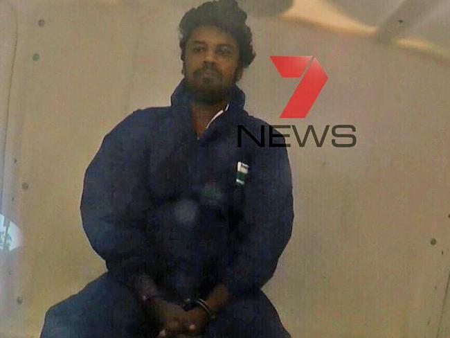 Bhanu Kirkman in the back of a NSW Police van. Picture: Seven News