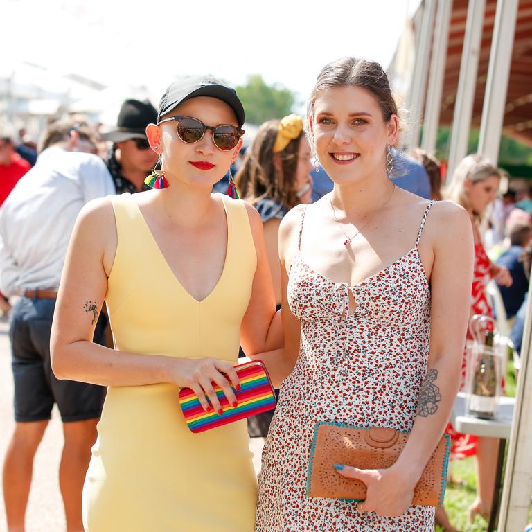 Bec Cox (L) and Tenille Keogh as punters enjoy the 2020 Great Northern Darwin Cup. Picture: GLENN CAMPBELL