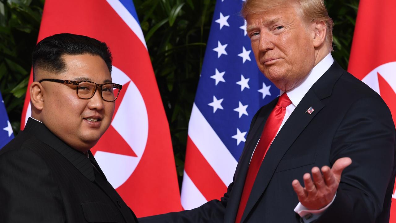 Kim clearly had his mind on the job during the Singapore summit. Picture: Saul Loeb/AFP