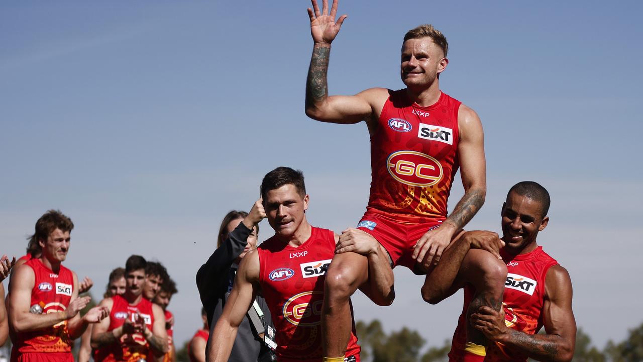 Ellis was chaired off by Suns teammates in Ballarat in March after playing his 250th game. Picture: Daniel Pockett / Getty Images