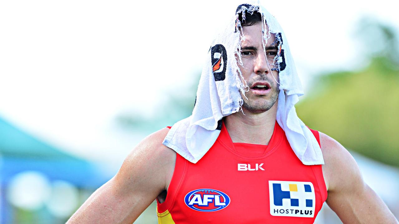 NAB Challenge match between the Gold Coast Suns v Geelong Cats from Tony Ireland Stadium, Townsville. Suns Michael Rischitelli feels the heat. Picture: Zak Simmonds