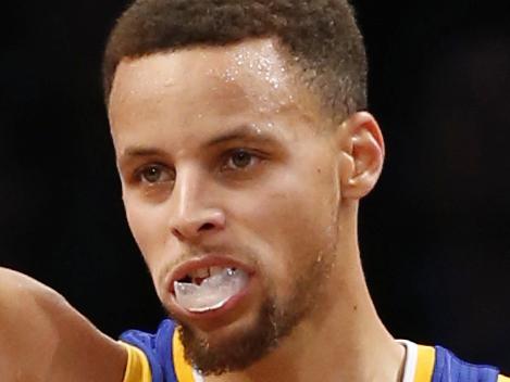 Golden State Warriors guard Stephen Curry (30) reacts after scoring in the second half of an NBA basketball game against the Brooklyn Nets, Sunday, Dec. 6, 2015, in New York. Curry had 28 points as the Warriors defeated the Nets 114-98. (AP Photo/Kathy Willens)