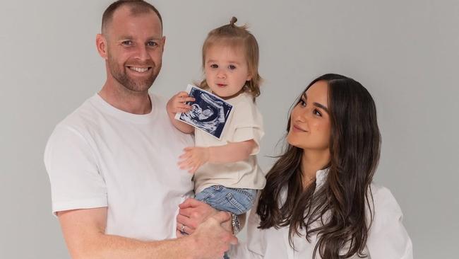 Sam Docherty and wife Natalie with daughter Ruby.