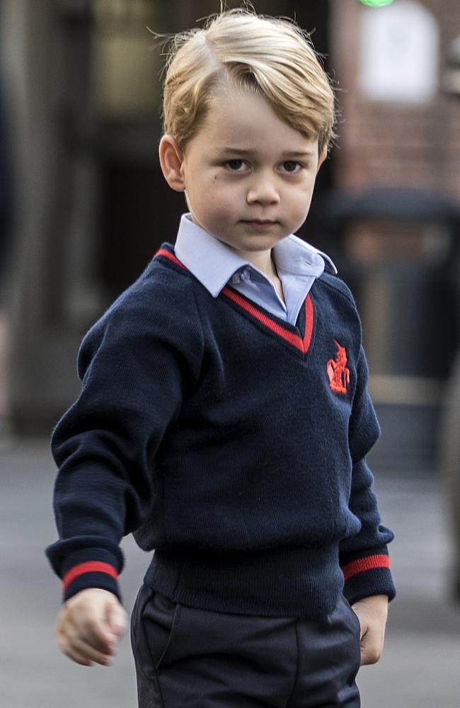 The world watches every one of his milestones, like his first day of kindergarten at Thomas's school in Battersea. Picture: Richard Pohle/AFP