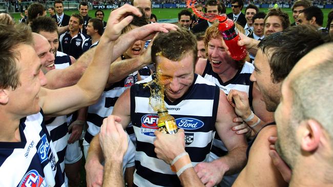 Steve Johnson gets showered with Powerade after he was announced the Norm Smith Medallist.