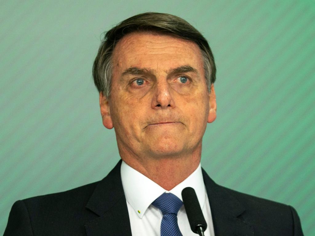 Brazilian President Jair Bolsonaro said it was “difficult to not be emotional before (the) scene. Picture: Sergio Lima/AFP