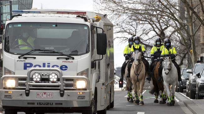 Mounted police patrol Melbourne during lockdown. Picture: NCA NewsWire / David Geraghty