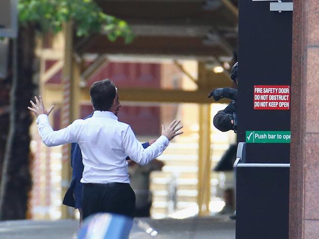 John was accompanied by Sydney barrister Stefan Balafoutis for their escape. Picture: Don Arnold/Getty Images