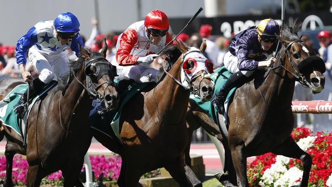 NCA. MELBOURNE, AUSTRALIA. October 26, 2024. Racing.  Cox Plate day at Moonee Valley racecourse.. Race 6. The Drummond Golf Vase.   Red Aces ridden by Jamie Mott (red cap) does enough to beat home Opening Address ridden by Ethan brown (rails) and King of Thunder ridden by James McDonald (outside)  .  Pictures : Michael Klein