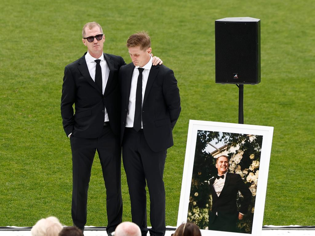 Adam and Scott Selwood at their brother Troy’s funeral.