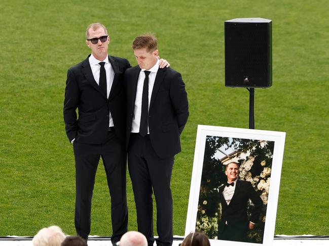 Adam and Scott Selwood at their brother Troy’s funeral.