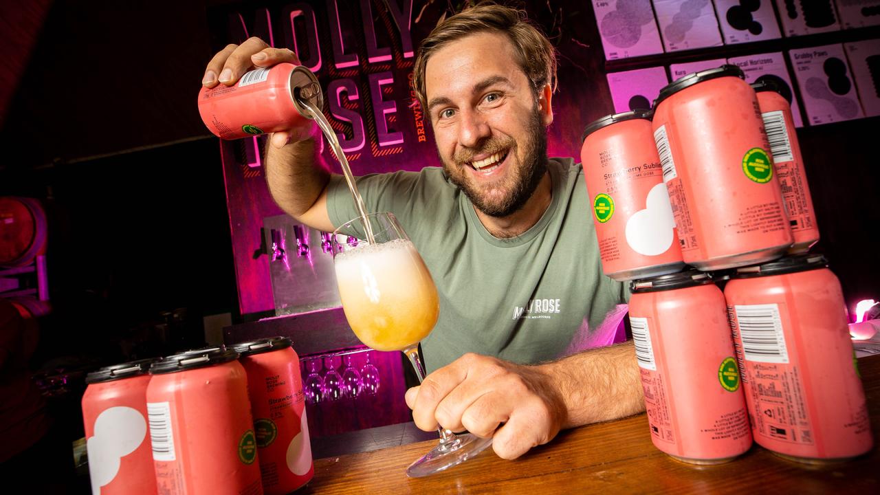 Molly Rose Brewing founder and brewer Nic Sandery pours a non-alcoholic Strawberry Sublime. Picture: Jake Nowakowski